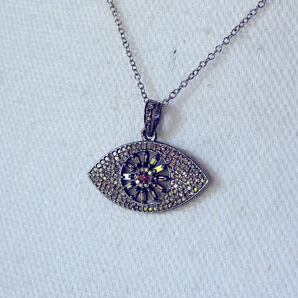 Cool Diamond/sterling silver evil eye !